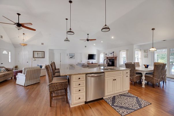 Dining room, Interior, Kitchen, Living room, Pendant Lights, Recessed Lighting, Stainless Steel Appliances, Wood Texture Flooring