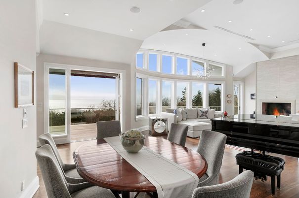 Dining room, Fireplace, Interior, Living room, Pendant Lights, Recessed Lighting, Water, Wood Texture Flooring