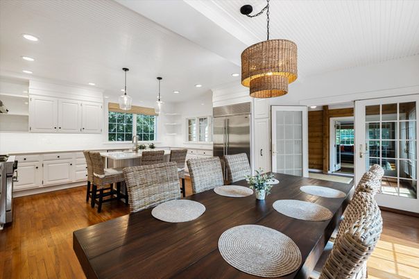 Chandelier, Dining room, Interior, Kitchen, Pendant Lights, Recessed Lighting, Stainless Steel Appliances, Wood Texture Flooring