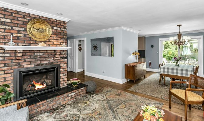 Chandelier, Dining room, Fireplace, Interior, Recessed Lighting, Stone Walls, Wood Texture Flooring