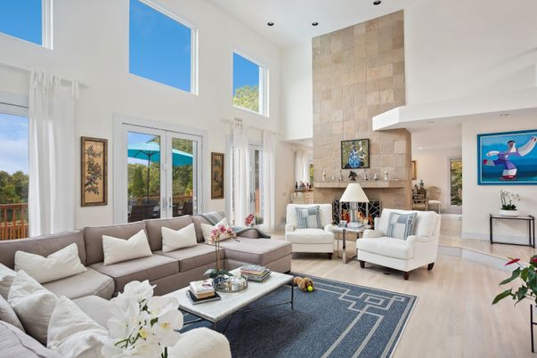 Fireplace, Interior, Living room, Recessed Lighting, Stone Walls, Wood Texture Flooring