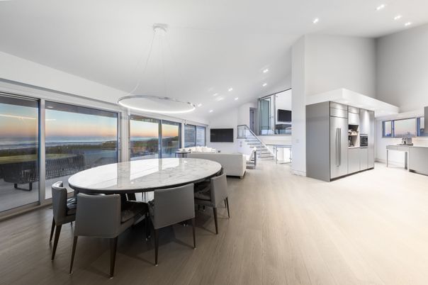 Dining room, Interior, Kitchen, Pendant Lights, Recessed Lighting, Stainless Steel Appliances, Water, Wood Texture Flooring