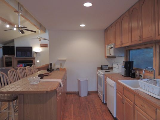 Interior, Kitchen, Recessed Lighting, Tile Countertops, Wood Texture Flooring