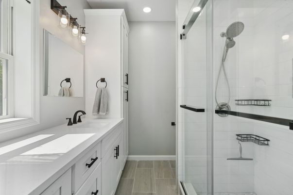 Bathroom, Dual Sink Vanities, Glass Shower, Interior, Recessed Lighting, Wood Texture Flooring