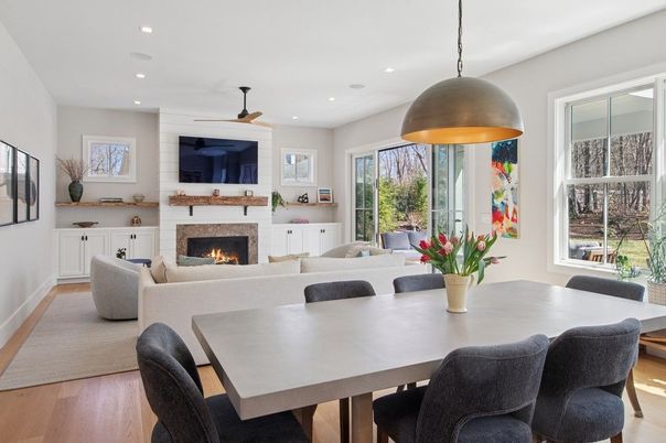 Dining room, Fireplace, Interior, Living room, Pendant Lights, Recessed Lighting, Wood Texture Flooring