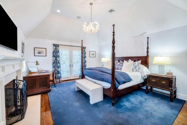 Bedroom, Chandelier, Fireplace, Interior, Recessed Lighting, Wood Texture Flooring
