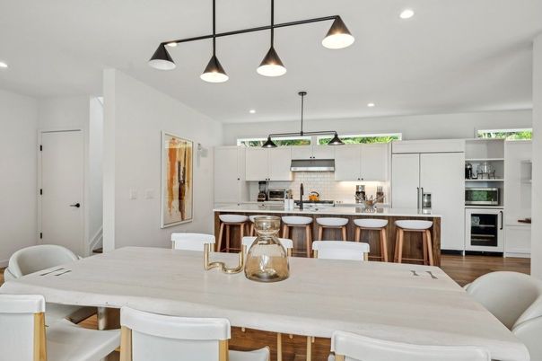 Dining room, Interior, Kitchen, Pendant Lights, Recessed Lighting, Stainless Steel Appliances, Wood Texture Flooring