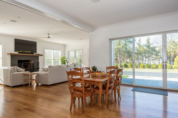 Dining room, Fireplace, Interior, Living room, Recessed Lighting, Wood Texture Flooring
