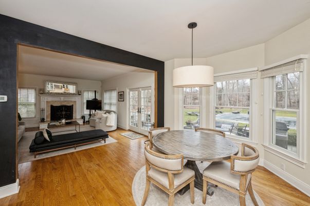 Dining room, Fireplace, Interior, Pendant Lights, Wood Texture Flooring