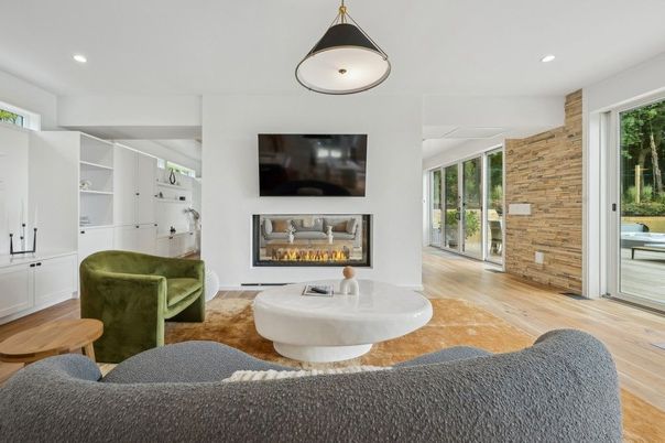 Fireplace, Interior, Living room, Recessed Lighting, Stone Walls, Wood Texture Flooring