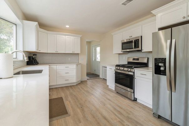 Interior, Kitchen, Recessed Lighting, Stainless Steel Appliances, Wood Texture Flooring