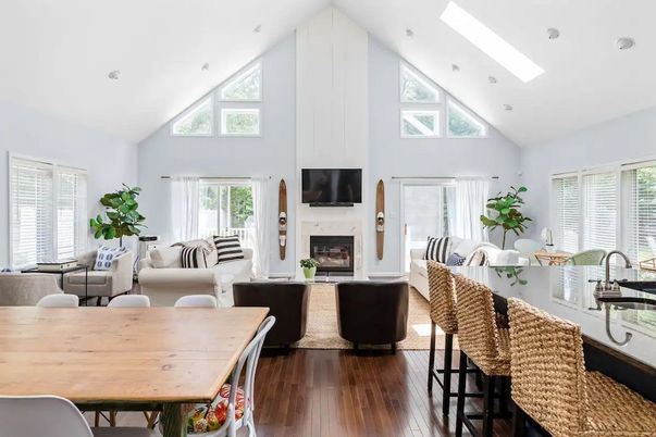 Dining room, Fireplace, Interior, Living room, Recessed Lighting, Wood Texture Flooring