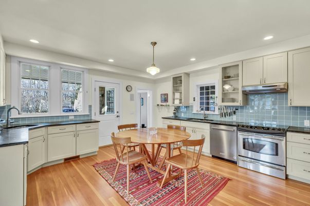 Dining room, Interior, Kitchen, Pendant Lights, Recessed Lighting, Stainless Steel Appliances, Wood Texture Flooring