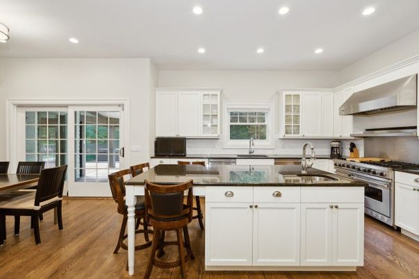 Dining room, Interior, Kitchen, Recessed Lighting, Stainless Steel Appliances, Wood Texture Flooring