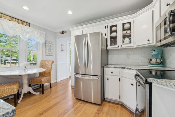 Dining room, Interior, Kitchen, Recessed Lighting, Stainless Steel Appliances, Wood Texture Flooring