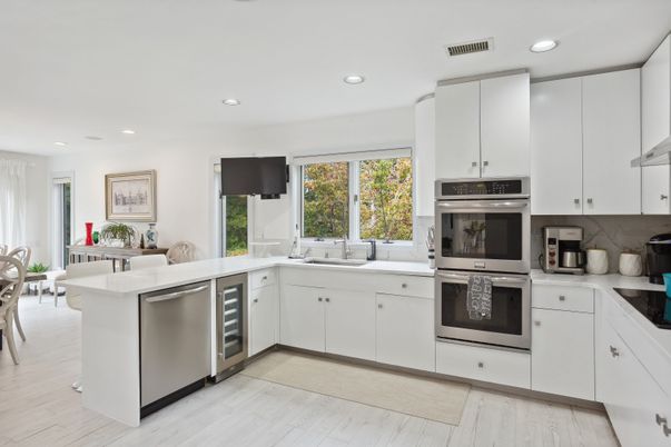 Dining room, Interior, Kitchen, Recessed Lighting, Stainless Steel Appliances, Wood Texture Flooring