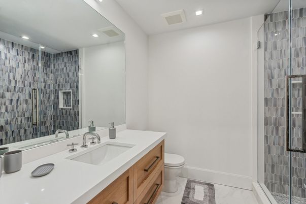 Bathroom, Dual Sink Vanities, Glass Shower, Interior, Marble, Recessed Lighting