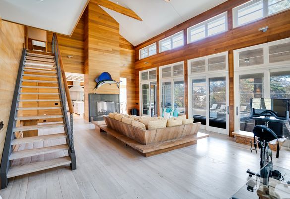 Fireplace, Fitness Equipment, Interior, Living room, Recessed Lighting, Wood Texture Flooring, Wooden Walls