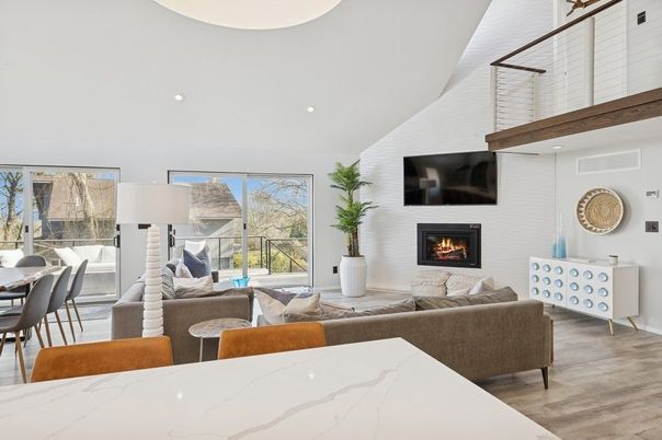 Dining room, Fireplace, Interior, Living room, Recessed Lighting, Wood Texture Flooring