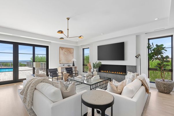Fireplace, Interior, Living room, Pendant Lights, Recessed Lighting, Water, Wood Texture Flooring
