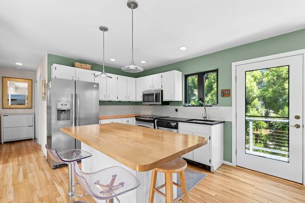Interior, Kitchen, Pendant Lights, Recessed Lighting, Stainless Steel Appliances, Wood Texture Flooring