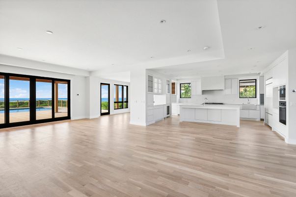 Empty room, Interior, Kitchen, Recessed Lighting, Water, Wood Texture Flooring