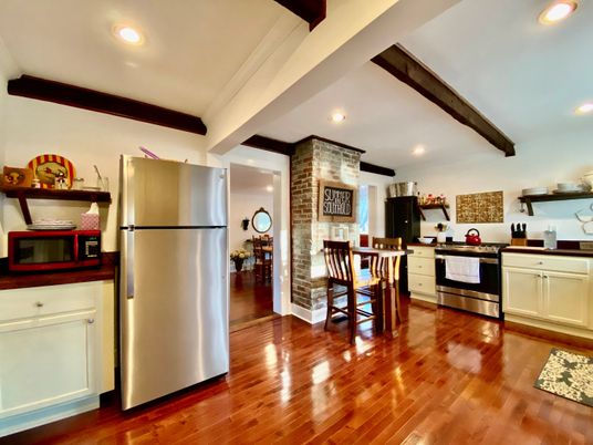Dining room, Interior, Kitchen, Recessed Lighting, Stainless Steel Appliances, Stone Walls, Wooden Beams, Wood Texture Flooring