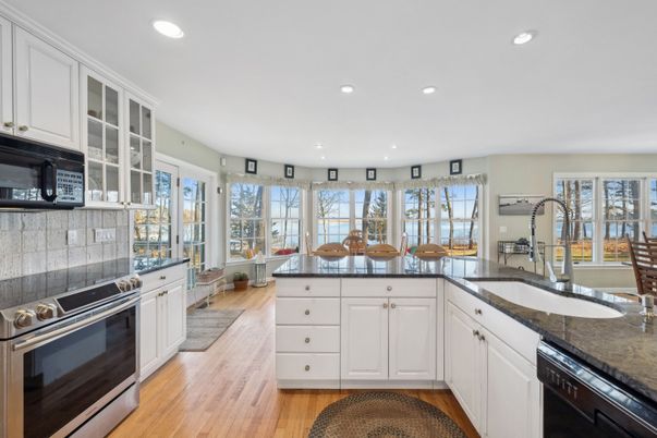 Interior, Kitchen, Recessed Lighting, Tile Countertops, Wood Texture Flooring