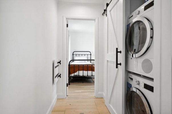 Bedroom, Interior, Utility Closets, Washer, Wood Texture Flooring
