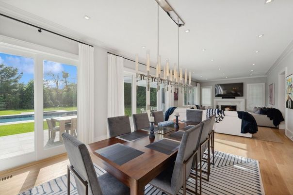 Dining room, Fireplace, Interior, Living room, Pendant Lights, Recessed Lighting, Wood Texture Flooring