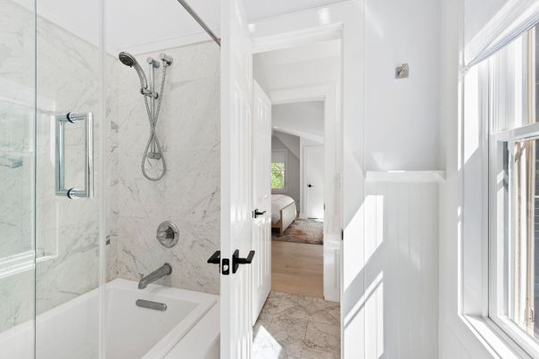 Bathroom, Glass Shower, Interior, Marble Walls, Wood Texture Flooring