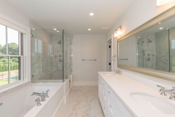 Bathroom, Dual Sink Vanities, Glass Shower, Interior, Marble, Marble Walls, Recessed Lighting