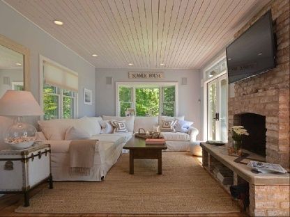 Fireplace, Interior, Living room, Recessed Lighting, Stone Walls, Wood Texture Flooring