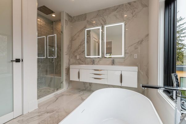 Bathroom, Dual Sink Vanities, Free Standing Baths, Glass Shower, Interior, Marble, Marble Walls, Recessed Lighting