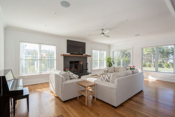 Fireplace, Interior, Living room, Piano, Recessed Lighting, Wood Texture Flooring