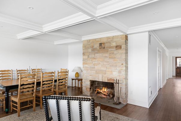 Dining room, Fireplace, Interior, Recessed Lighting, Stone Walls, Wood Texture Flooring