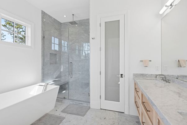 Bathroom, Dual Sink Vanities, Free Standing Baths, Glass Shower, Interior, Marble Walls, Recessed Lighting