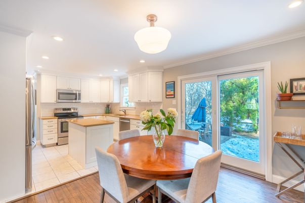 Dining room, Interior, Kitchen, Recessed Lighting, Stainless Steel Appliances, Wood Texture Flooring