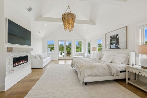 Bedroom, Fireplace, Interior, Pendant Lights, Recessed Lighting, Wood Texture Flooring