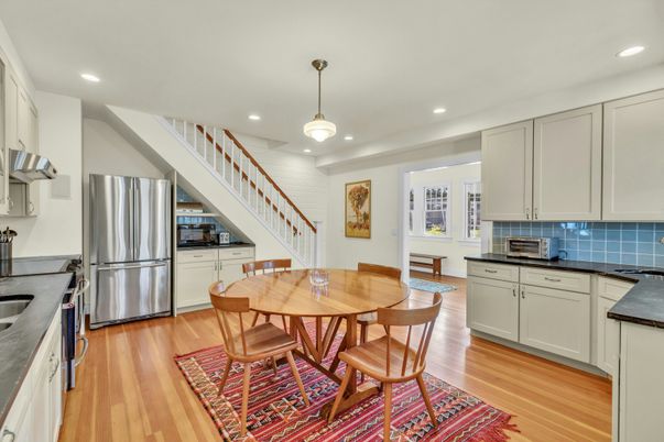 Dining room, Interior, Kitchen, Pendant Lights, Recessed Lighting, Stainless Steel Appliances, Wood Texture Flooring