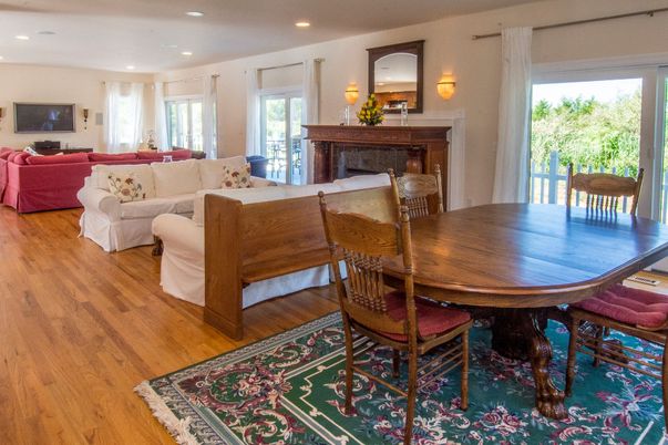 Dining room, Fireplace, Interior, Living room, Recessed Lighting, Wood Texture Flooring