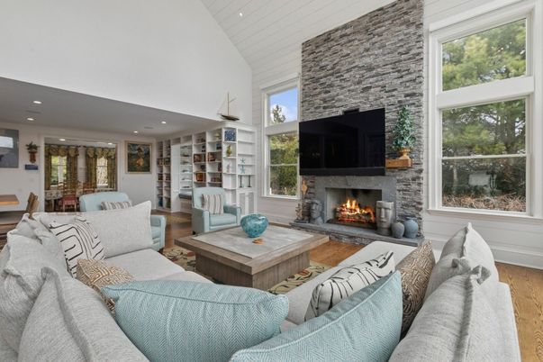 Fireplace, Interior, Living room, Recessed Lighting, Stone Walls, Wood Texture Flooring