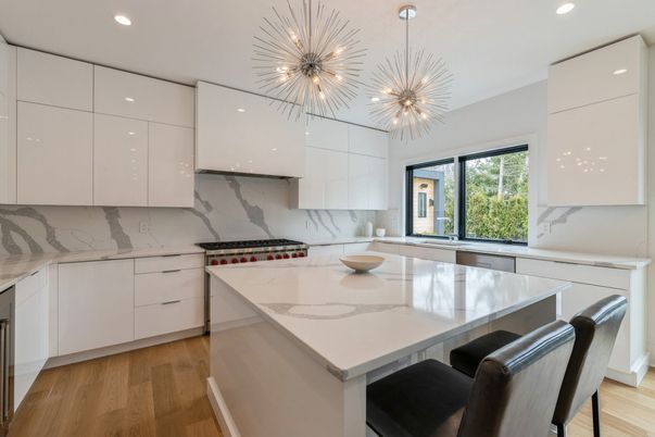 Interior, Kitchen, Marble Walls, Pendant Lights, Recessed Lighting, Stainless Steel Appliances, Wood Texture Flooring
