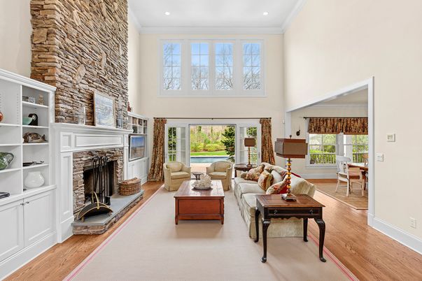 Fireplace, Interior, Living room, Recessed Lighting, Stone Walls, Wood Texture Flooring
