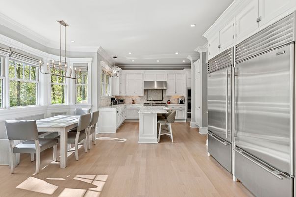 Chandelier, Dining room, Interior, Kitchen, Pendant Lights, Recessed Lighting, Stainless Steel Appliances, Wood Texture Flooring