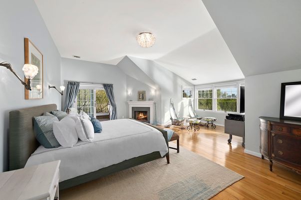 Bedroom, Chandelier, Fireplace, Interior, Wood Texture Flooring