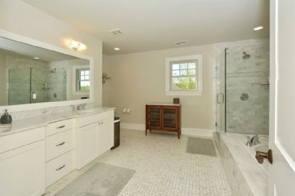 Bathroom, Dual Sink Vanities, Glass Shower, Interior, Marble Walls, Recessed Lighting