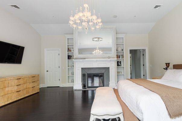 Bedroom, Chandelier, Fireplace, Interior, Recessed Lighting, Wood Texture Flooring