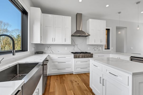 Interior, Kitchen, Marble Walls, Pendant Lights, Recessed Lighting, Stainless Steel Appliances, Wood Texture Flooring
