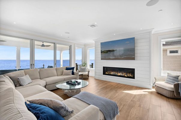Fireplace, Interior, Living room, Recessed Lighting, Water, Wood Texture Flooring